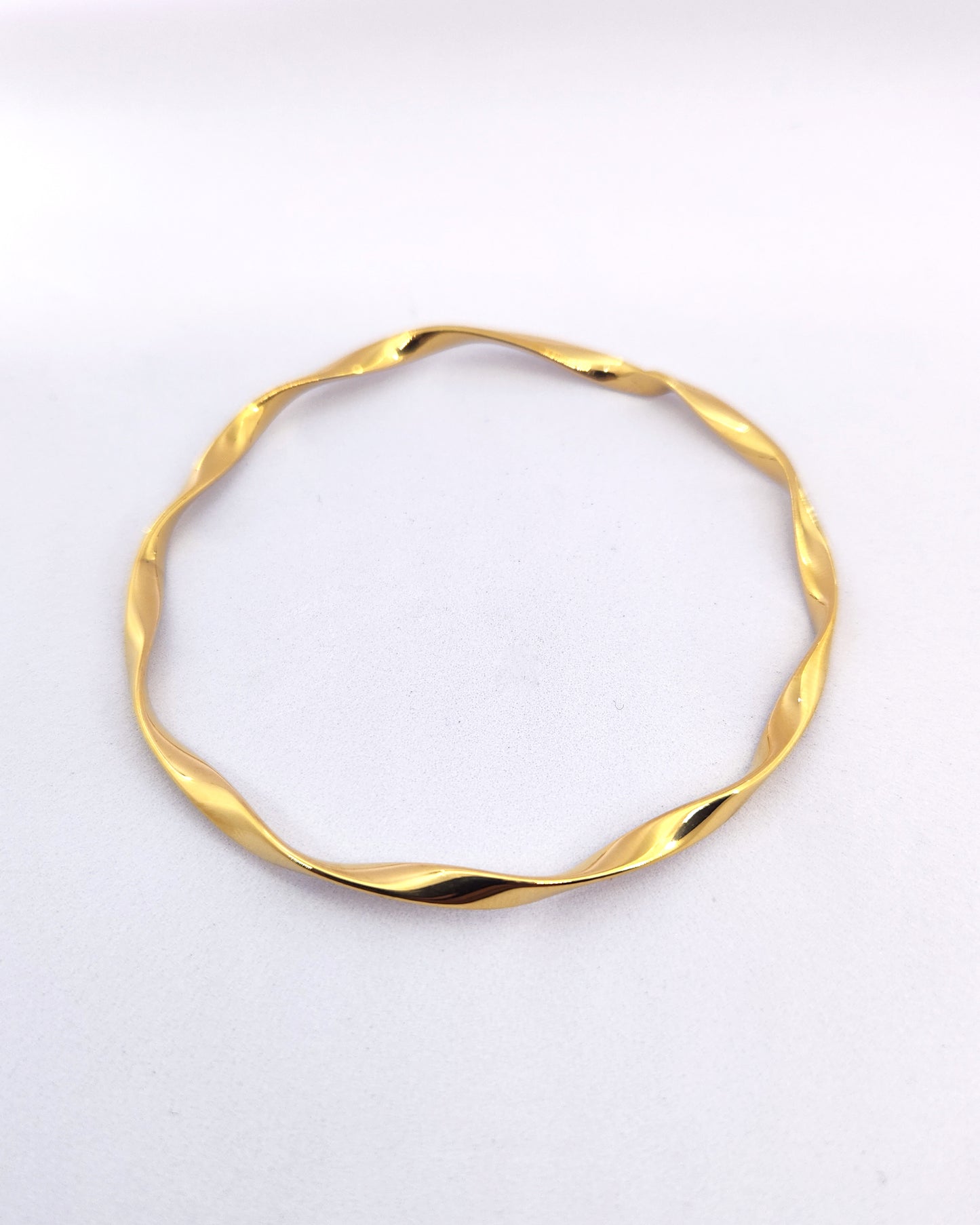 The Sculptural Twist Bangle | 18k Gold Plated Hypoallergenic