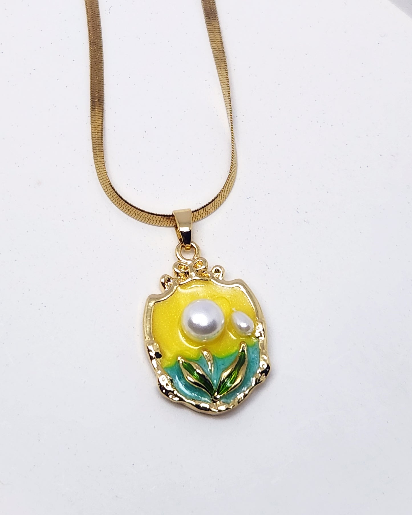 The Auraé Crest Pendant | Bold Enamel & Pearl Necklace