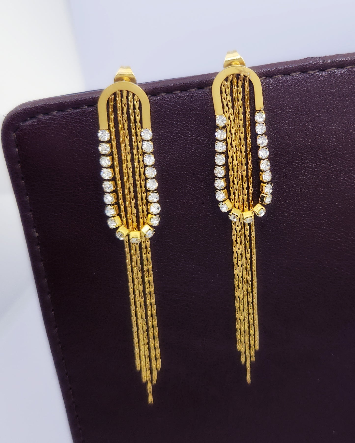 The Gilded Arch Tassel Earrings